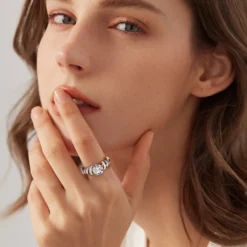 Alternative view of 1.5ct Moissanite Spiral Side Stone Ring