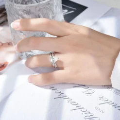 Alternative view of 2ct Pear Cut Moissanite Twist Side Stone Ring