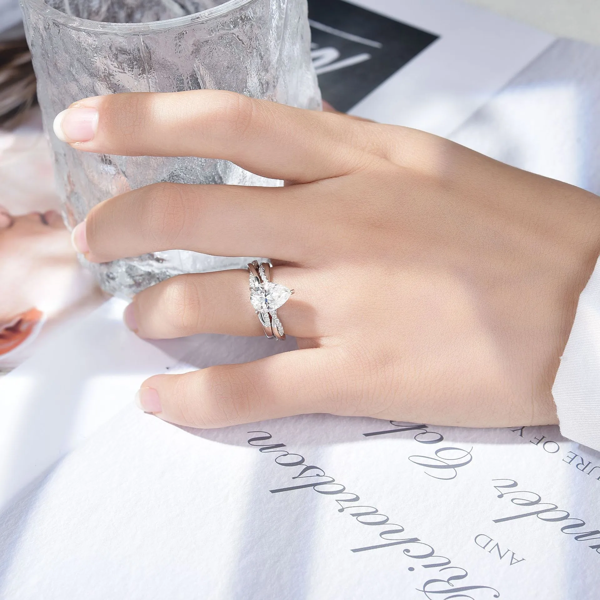 2ct Pear Cut Moissanite Twist Side Stone Ring - Image 2